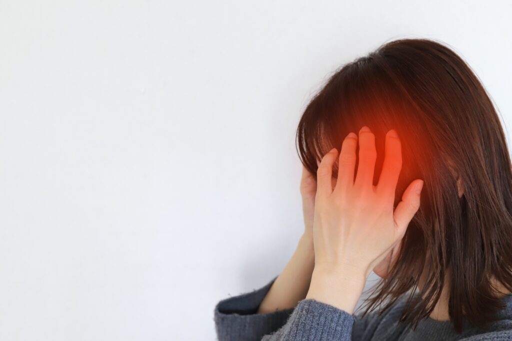 突然の激しい頭痛やしびれがあるときはツボを押さないための注意表示